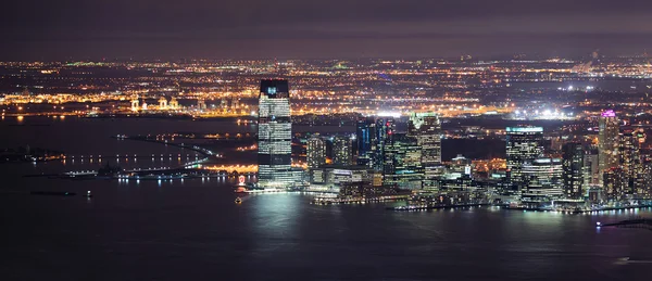 New jersey nacht panorama van new york city-manhattan — Stockfoto