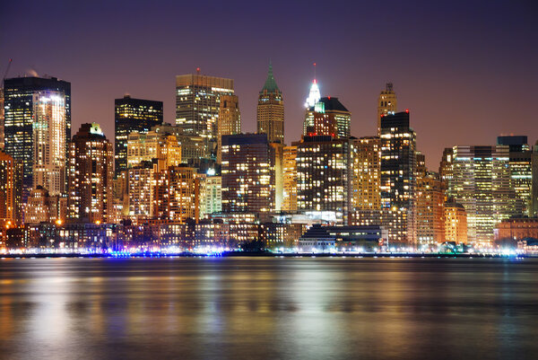 Urban City skyline night scene, New York City Manhattan skyline at night