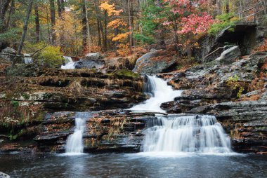 Autumn Waterfall in mountain clipart