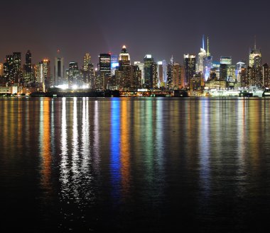 New York City Manhattan midtown skyline at night clipart
