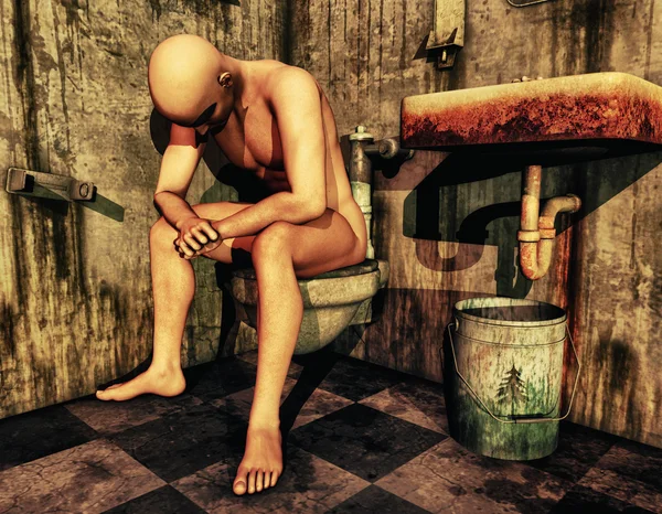 Nahý muž sedící na záchodě — Stock fotografie