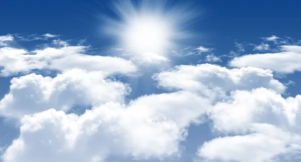 Photo of clouds and sun in the background of a beautiful blue sky — Stock Photo, Image