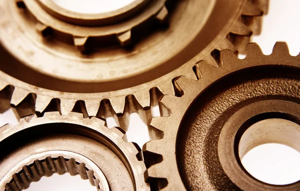 Closeup of three gears meshing together — Stock Photo, Image