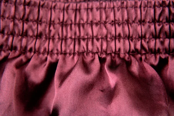 stock image Closeup of folds in purple color silk