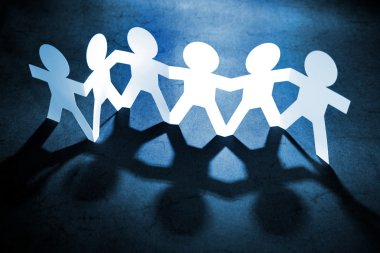 Team of six holding hands clipart