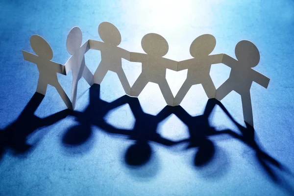 Team of six holding hands — Stock Photo, Image