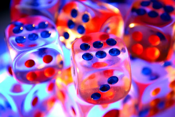Closeup of sixes on colorful dice — Stock Photo, Image
