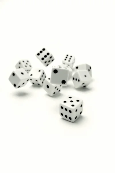 stock image Dice rolling on white background