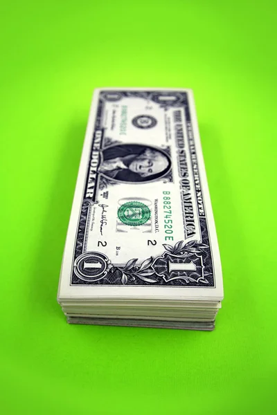 Billetes de un dólar en una pila — Foto de Stock