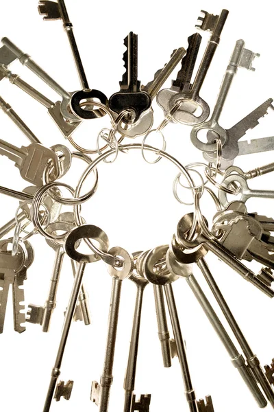 Closeup of keys on keyring over white — Stock Photo, Image