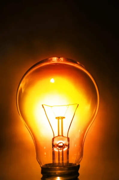 Closeup of a bright tungsten light bulb — Stock Photo, Image