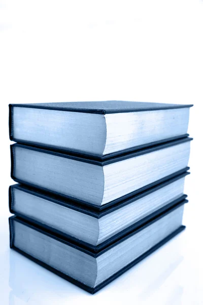 Pilha de livros isolados em branco — Fotografia de Stock