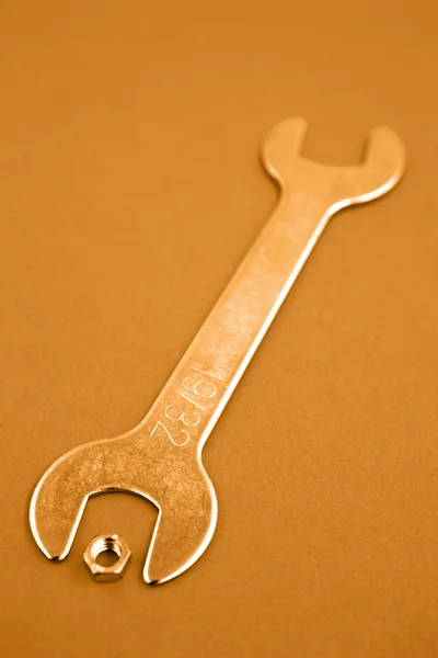 Spanner and nut — Stock Photo, Image