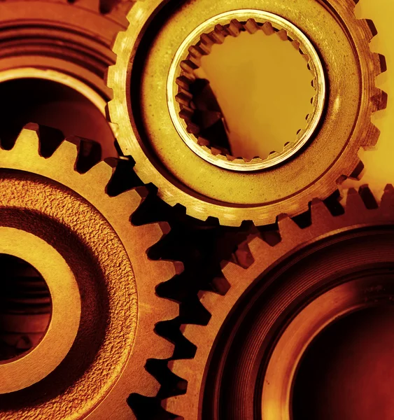 Closeup of steel gears joining together — Stock Photo, Image