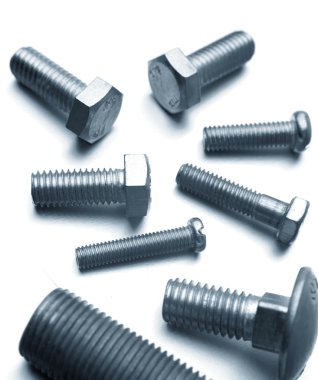 Bolts resting on a plain background clipart