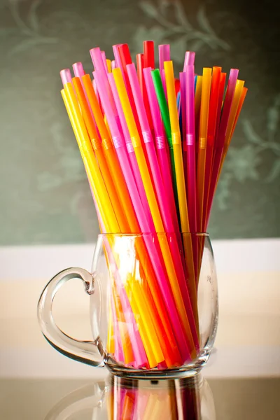 Plastic straws in plexy glassware — Stock Photo, Image