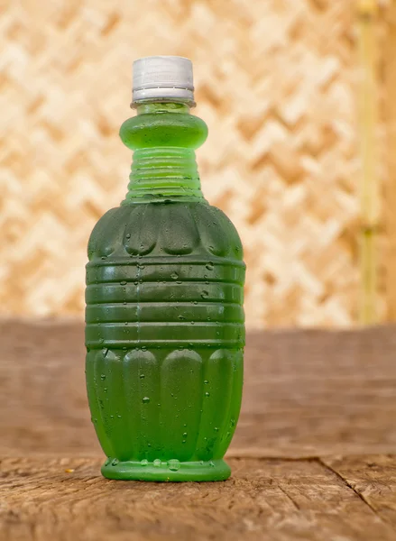 Soft drink from green crush chlorophyll water in plastic bottle — Stock Photo, Image