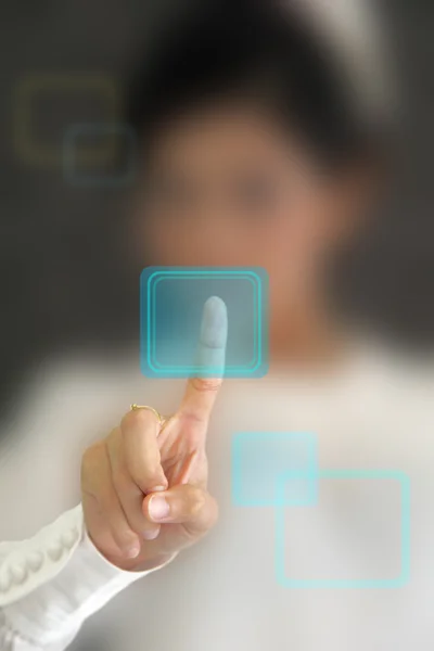 Hand pressing virtual button on futuristic holographic screen. — Stock Photo, Image