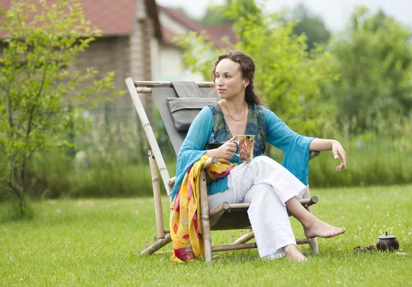 stock image Young woman relaxing on nature