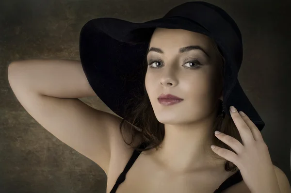 Portrait of beautiful girl in hat — Stock Photo, Image
