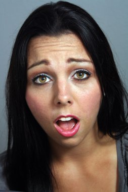 Beautiful Woman with Shocked Facial Expression clipart