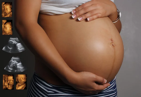 Ventre féminin enceinte avec échographie Images — Photo