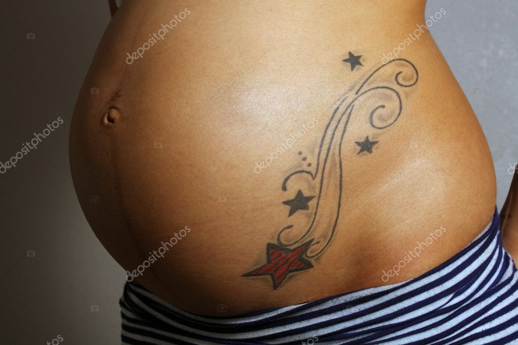 Pregnant Female Belly with Tattoo (1) Stock Photo by ©csproductions 6306562