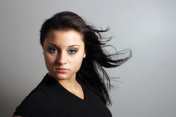 Beautiful Brunette with Hair Blowing — Stock Photo, Image