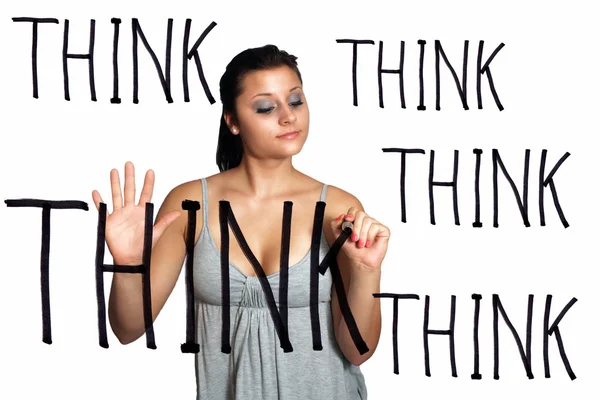 Mooie brunette schrijft "denk dat" — Stockfoto