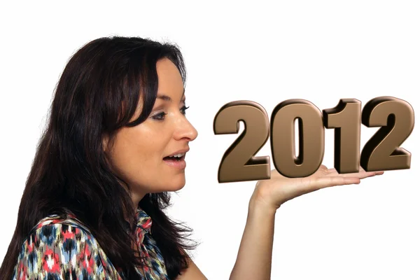 Beautiful Brunette Holding a 3-D "2012" — Stock Photo, Image