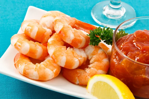 Fresh Shrimp on Aqua Background Stock Photo