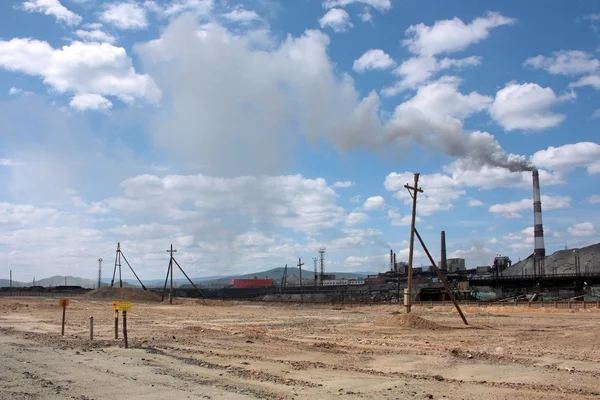 stock image Plant, smoking pipe and waste rock dumps