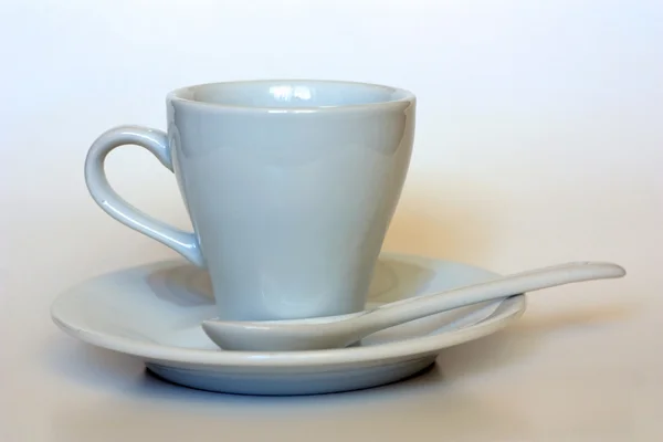 Cup, saucer and spoon — Stock Photo, Image