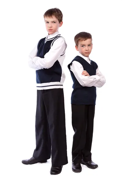 学校の制服を着た 2 人の兄弟の肖像画 — ストック写真