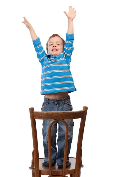 Mały chłopiec podnosi ręce w górę — Zdjęcie stockowe