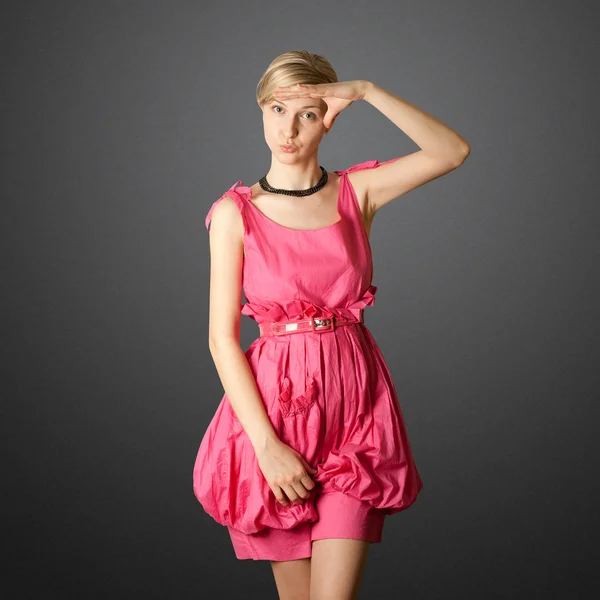 Azafata femenina sexy en rosa —  Fotos de Stock