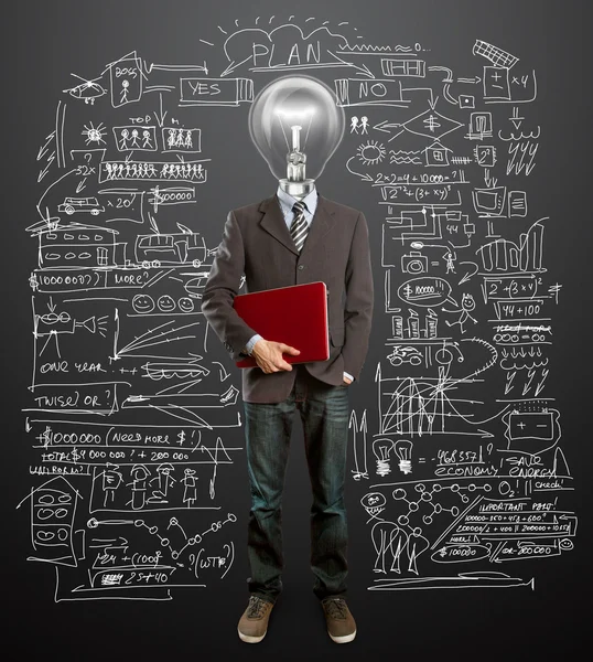 Férfi öltöny lámpával és a kezében laptop — Stock Fotó