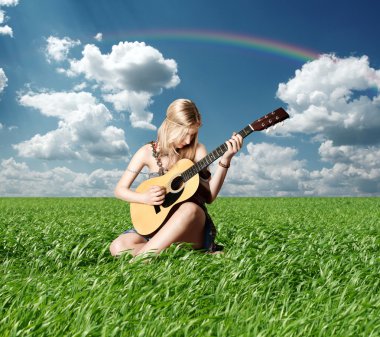 Hippie girl with the guitar outdoor clipart