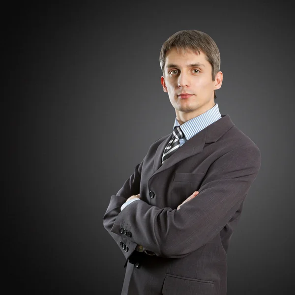 Uomo in giacca e cravatta con mani piegate — Foto Stock