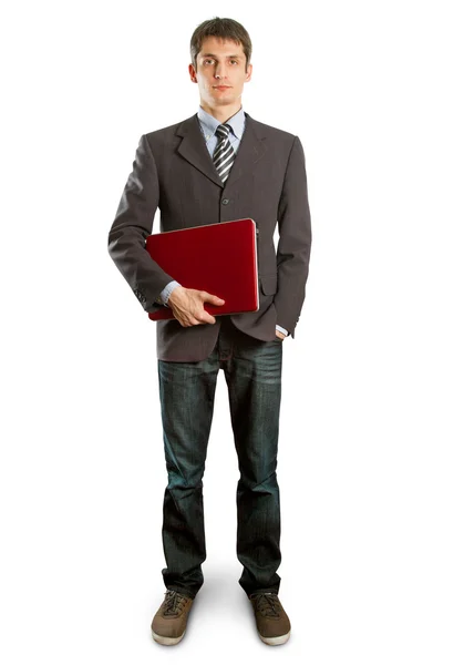 Αρσενικό σε κοστούμι με φορητό υπολογιστή στα χέρια του — Φωτογραφία Αρχείου