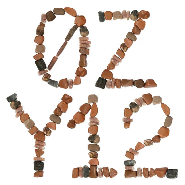 Alphabet aus Ozeansteinen in Nahaufnahme — Stockfoto