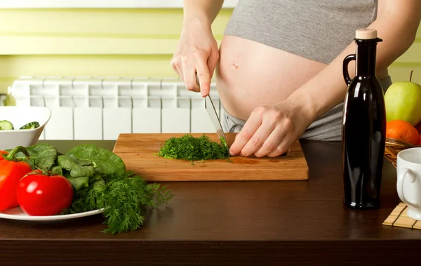 Pregnant woman on kitchen — Stock Photo, Image