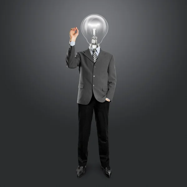 Lampa hlava podnikatel psát něco — Stock fotografie