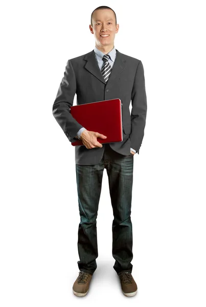 Male in suit with laptop in his hands — Stock Photo, Image