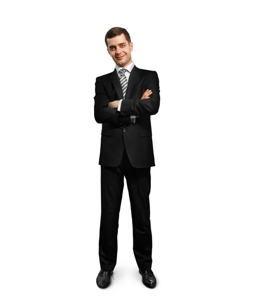 Celé délce muž v obleku se sepjatýma rukama — Stock fotografie