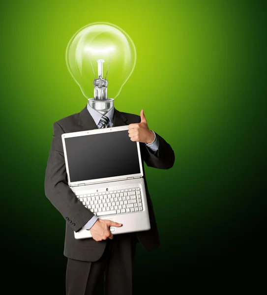 Biznesmen z lampy głowica z otworzyć laptopa pokazuje welldone — Zdjęcie stockowe