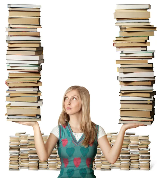 Mulher com muitos livros em suas mãos — Fotografia de Stock