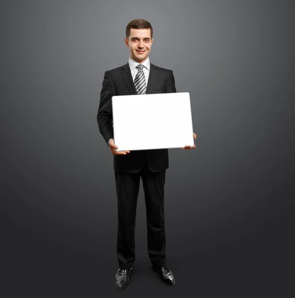 空の書き込みボードを持ったビジネスマン — ストック写真