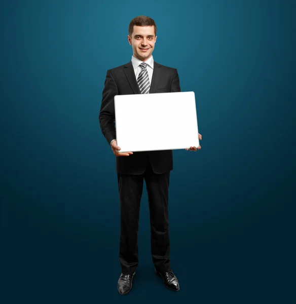 空の書き込みボードを持ったビジネスマン — ストック写真