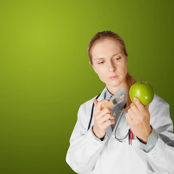 Mulher cientista com maçã — Fotografia de Stock